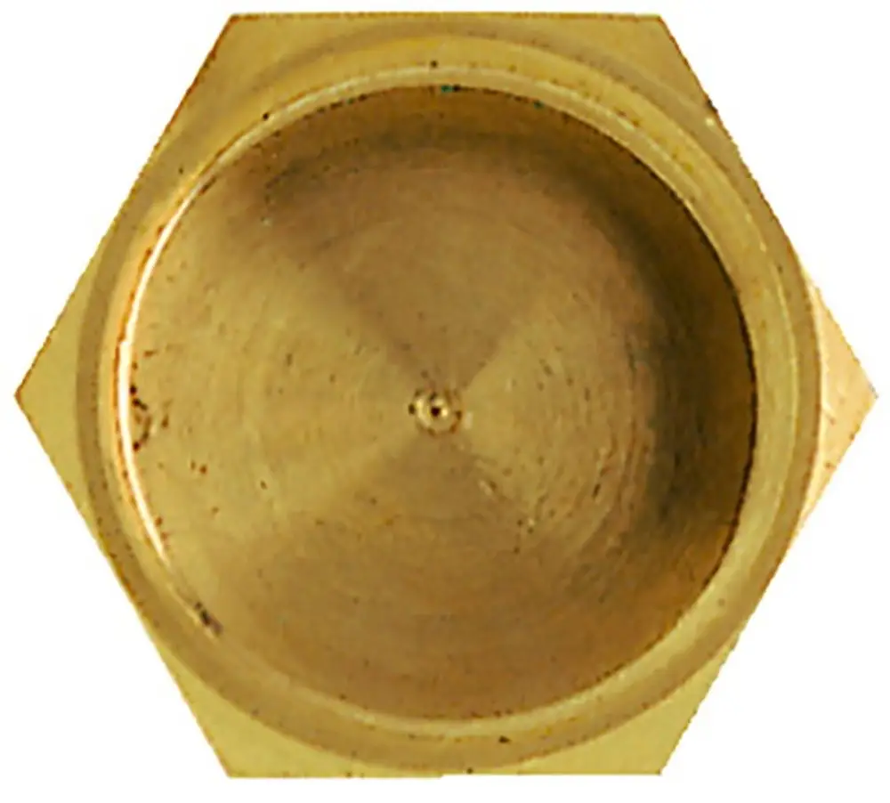 Brass closure cap, hexagonal shape, open top. Suitable for various plumbing applications. Manufactured by IMI Hydronic Engineering.
